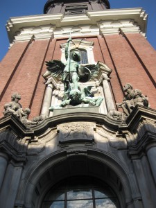 Michel - St Michael slaying the devil over the entrance