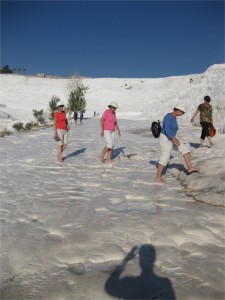 Walking up the hill barefoot on the stone covered in running warm spring water