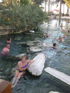 Bathing in the thermal spring waters with ancient marble columns