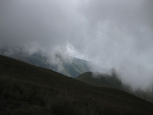 The side of the volcano covered in clouds