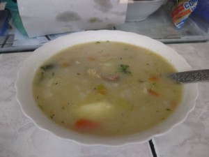 Hearty soup with meat and potatoes