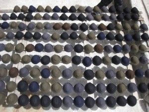 Little hats for dolls drying in the sun