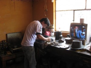 Shaping the brim of a cowboy hat