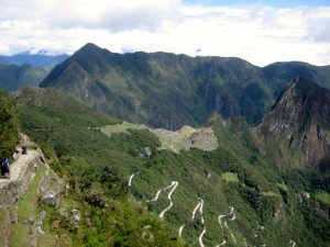 View of Machu Picchu from the Sun Gate.  The switch back road is where the bus comes up from Aguas Calientes.